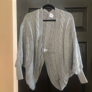 2 Sweaters in Black and L. Grey